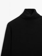 Wool blend knit sweater with high neck