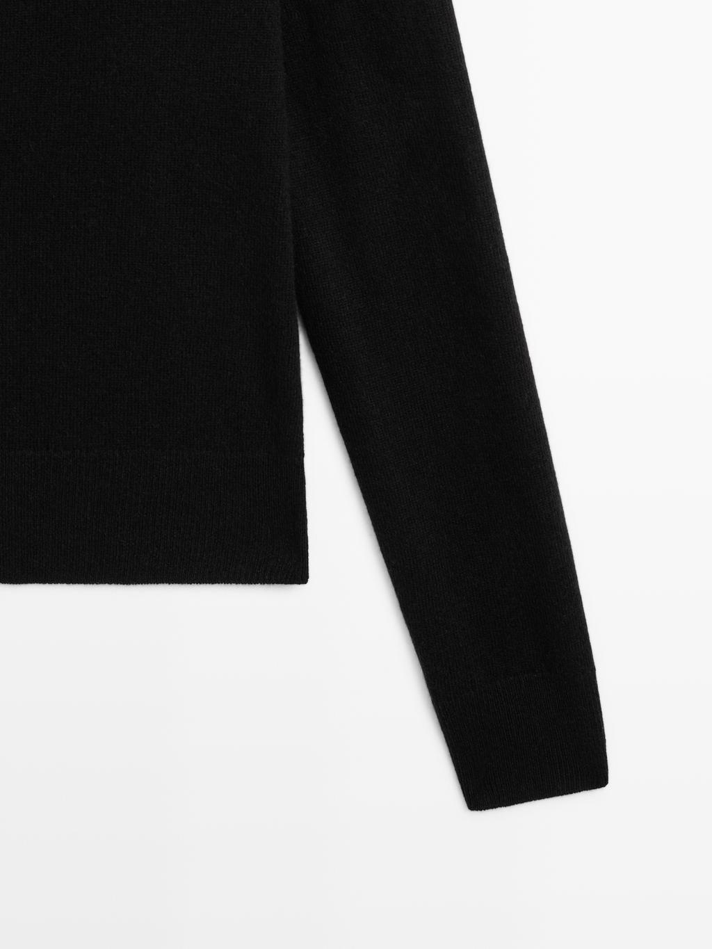 Wool blend knit sweater with high neck