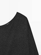 Wool blend knit sweater with asymmetric neckline
