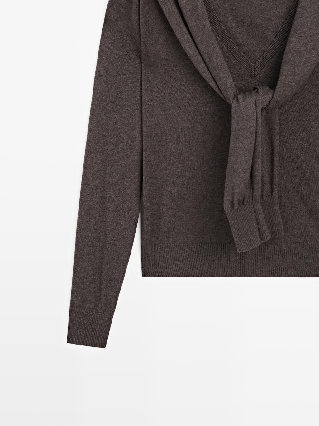 Knit sweater with multiway sleeves