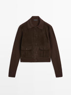 Short knit cardigan with contrast suede leather