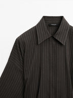 Striped overshirt with buckles