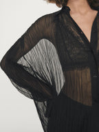 Long pleated loose-fitting shirt