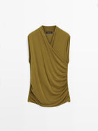 Draped top with surplice neckline