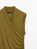 Draped top with surplice neckline