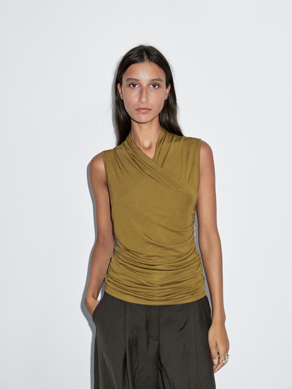 Draped top with surplice neckline