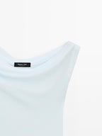 Sleeveless asymmetric top