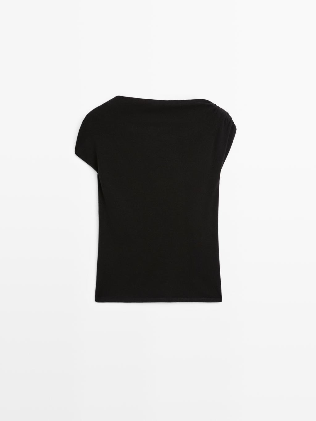 Sleeveless draped top with shoulder applique