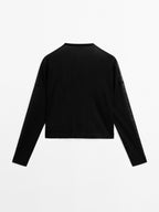 Loose-fitting V-neck sweater