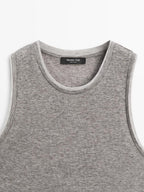 Sleeveless T-shirt with double trim