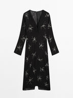 Flowing midi dress with embroidery