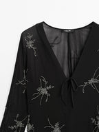 Flowing midi dress with embroidery