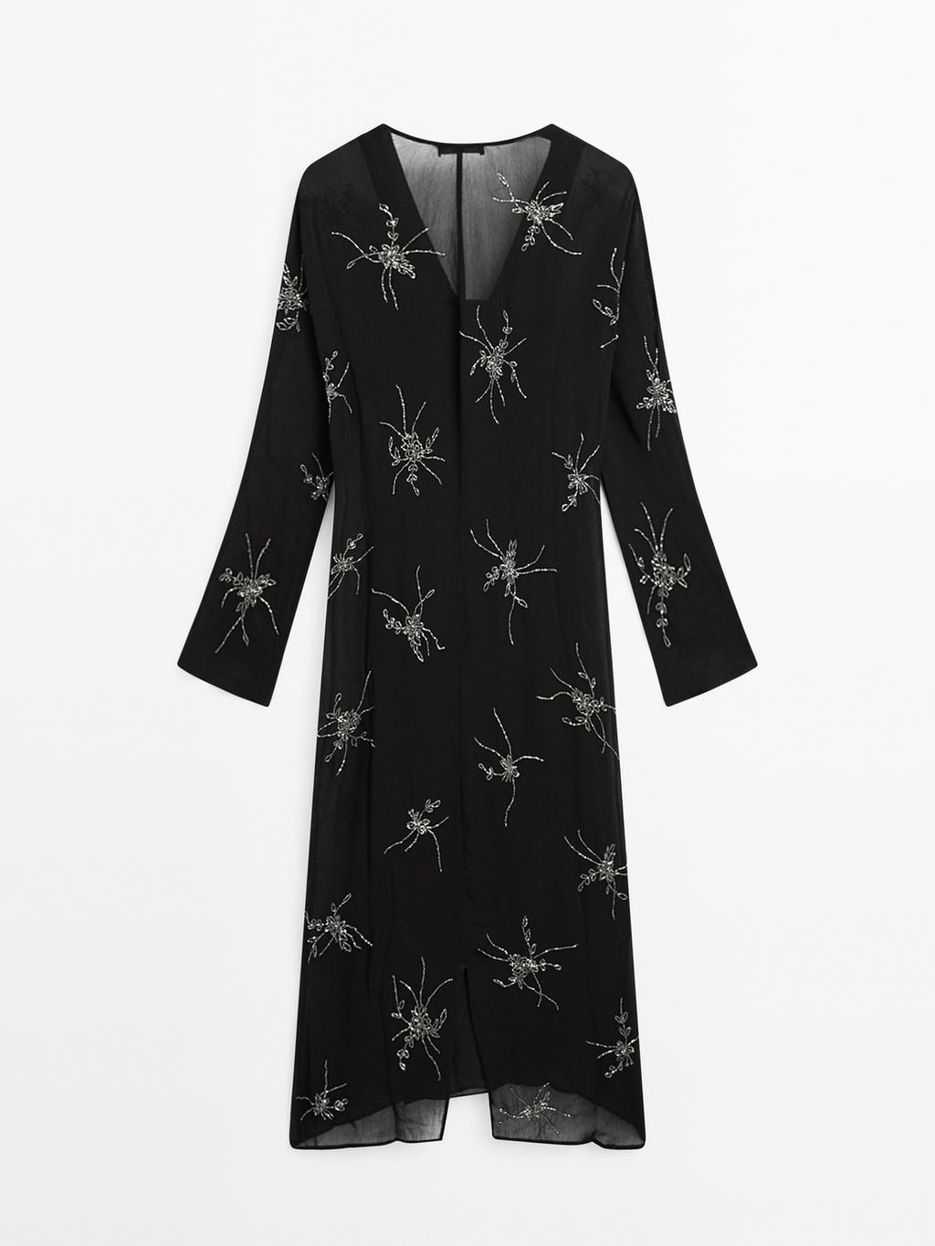 Flowing midi dress with embroidery
