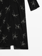 Flowing midi dress with embroidery