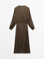 Long flowing printed dress with knot detail