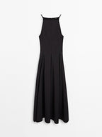 Long halter neck dress with flounce