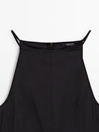 Long halter neck dress with flounce