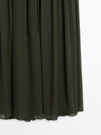 Long flowing dress with ruffle detail