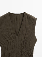 Creased-effect long pleated dress