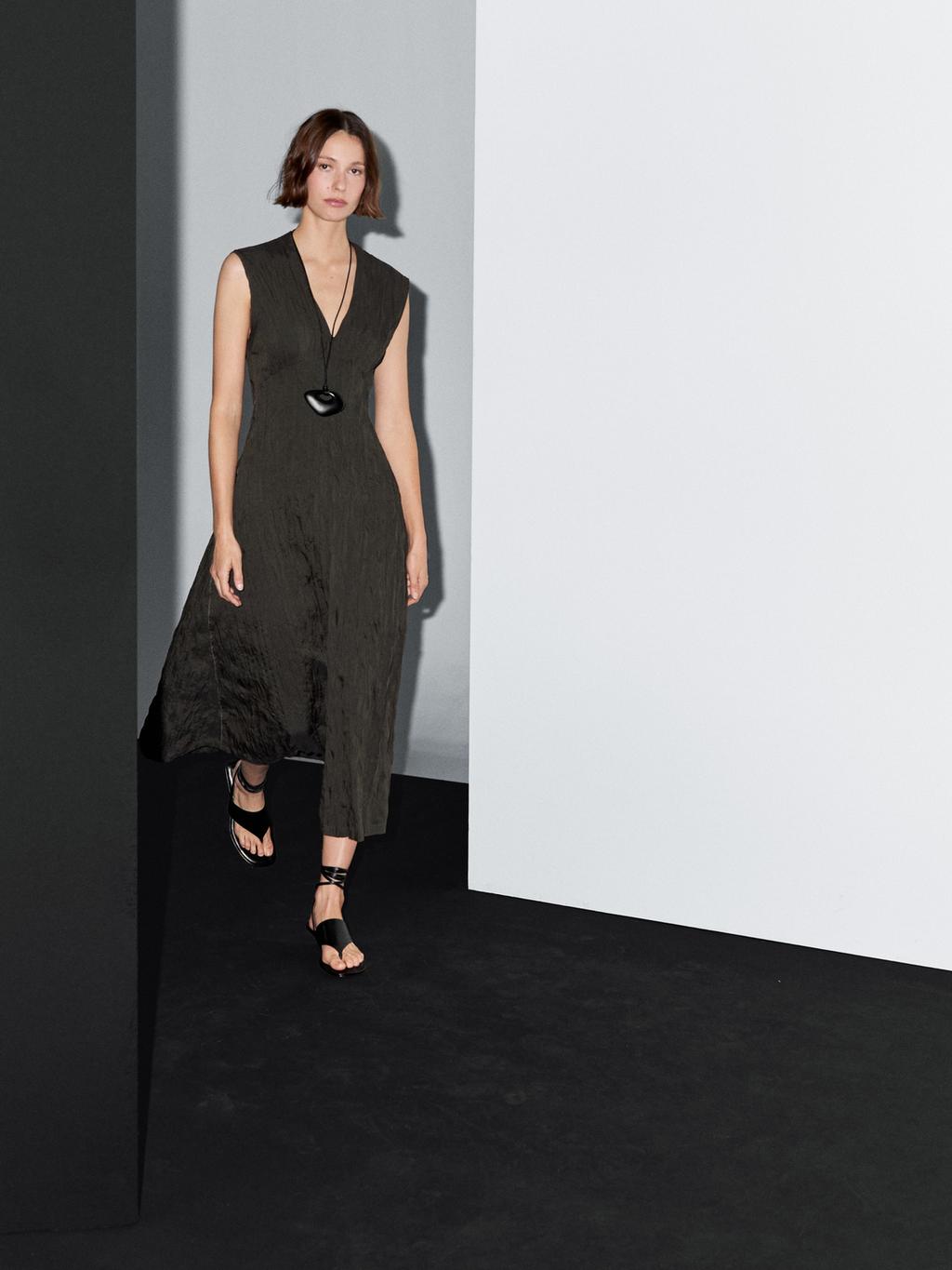 Creased-effect long pleated dress