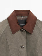 Water-repellent jacket with layered collar