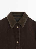 Short denim jacket with pockets and flocked finish