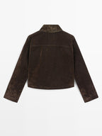 Short denim jacket with pockets and flocked finish