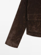 Short denim jacket with pockets and flocked finish