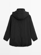 Water-repellent padded parka with high neck