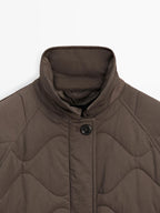 Long water-repellent puffer jacket