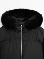 Technical down jacket with faux fur hood