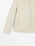 Short quilted jacket with shirt collar