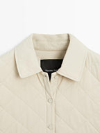 Short quilted jacket with shirt collar