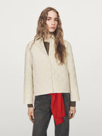 Short quilted jacket with shirt collar