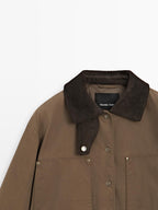 Waxed parka with corduroy detail