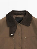 Waxed parka with corduroy detail