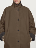 Waxed high neck parka with corduroy detail