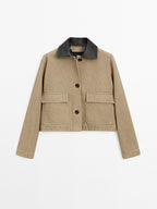 Jacket with detachable leather collar detail