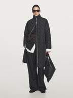 Long water-repellent oversize quilted parka