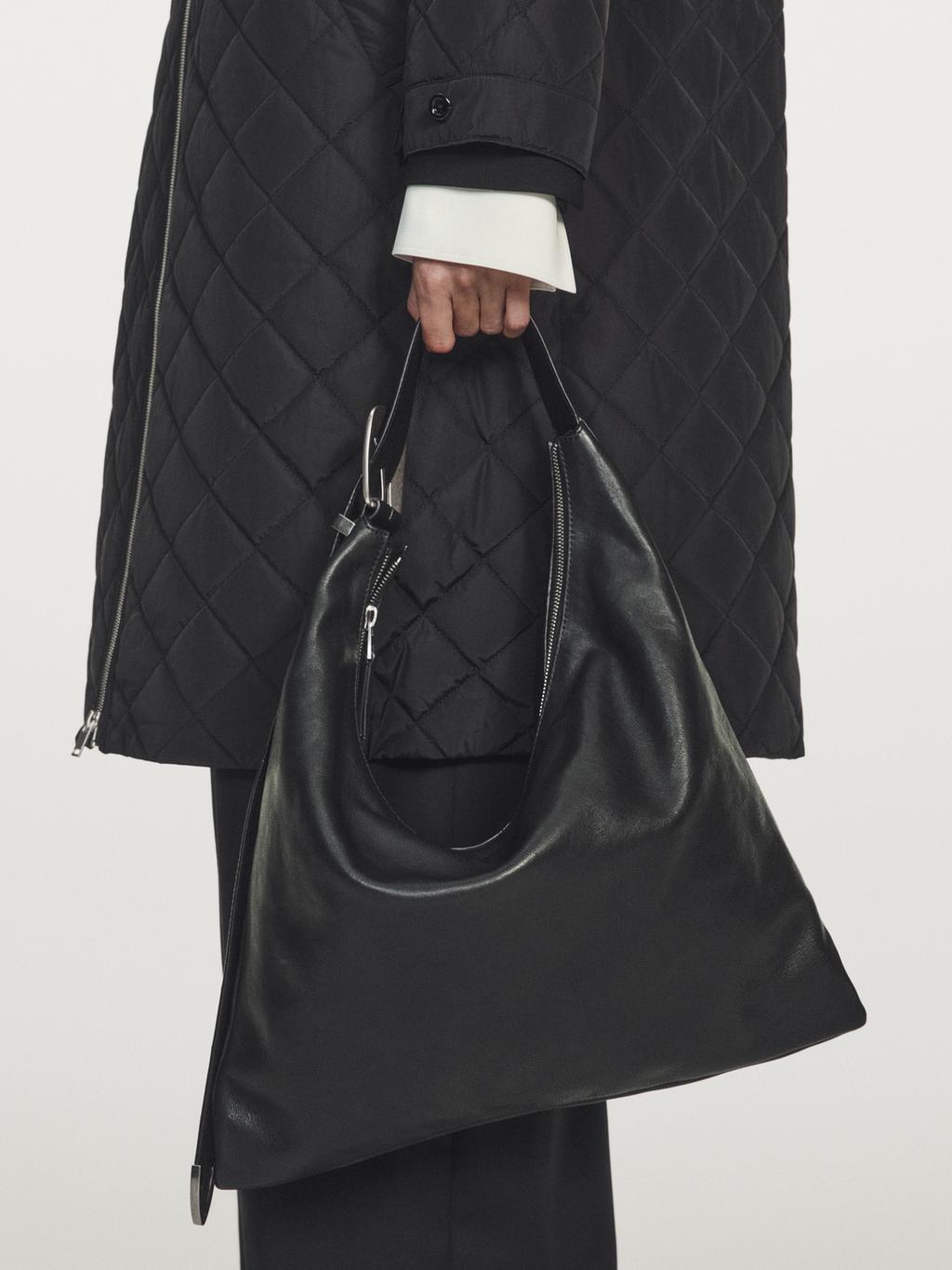 Long water-repellent oversize quilted parka