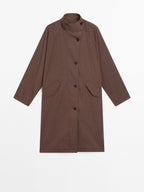 Oversize flowing trench coat in water-repellent fabric