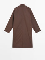 Oversize flowing trench coat in water-repellent fabric