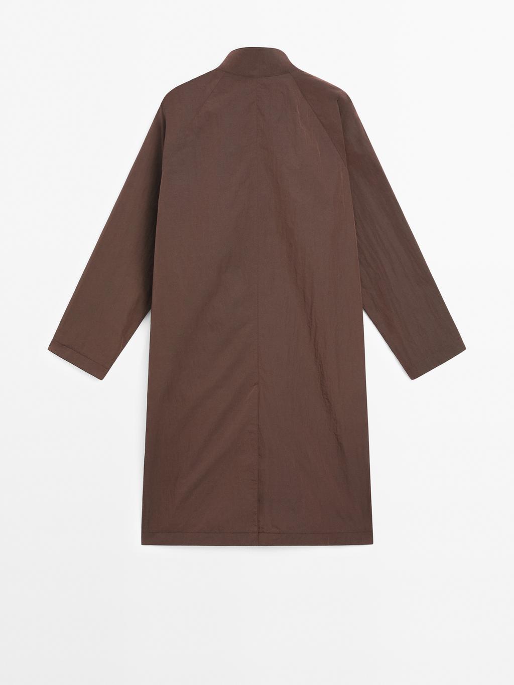 Oversize flowing trench coat in water-repellent fabric
