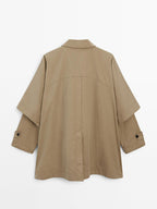 Cape trench coat with long sleeves