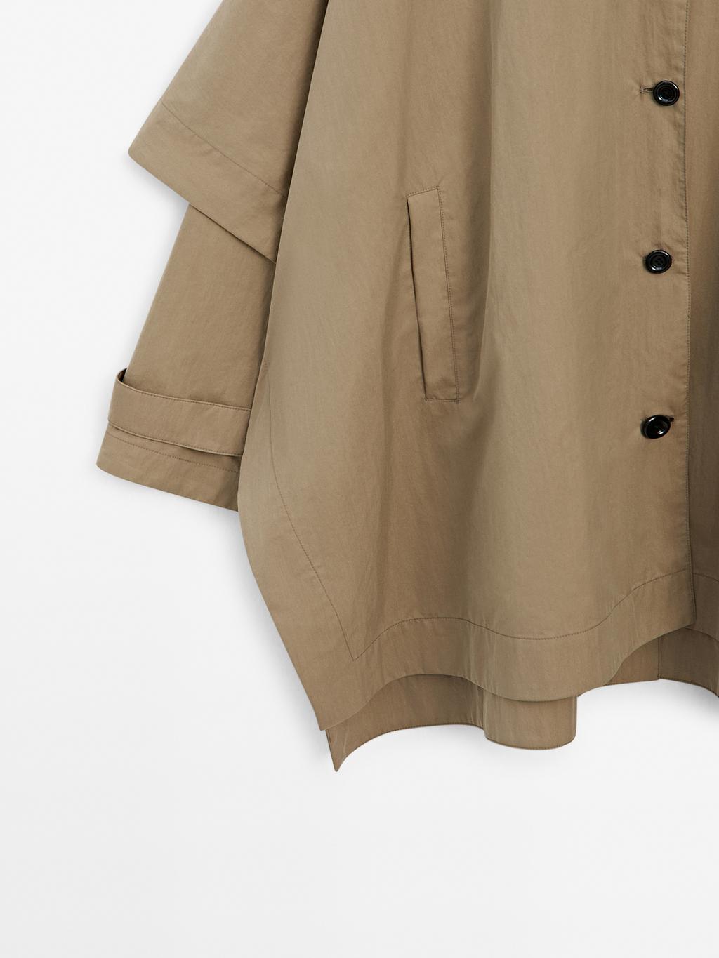 Cape trench coat with long sleeves