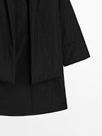 Long water-repellent padded coat with scarf detail