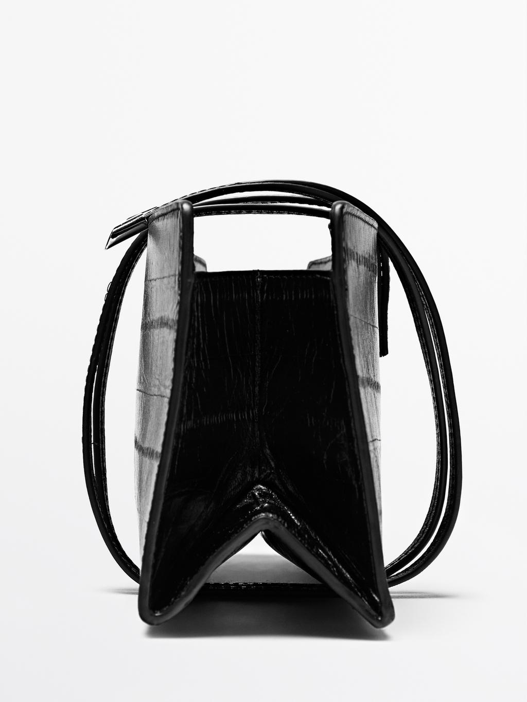 Textured leather handbag