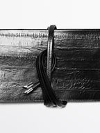 Textured leather handbag
