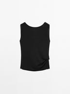 100% cotton top with draped low-cut back