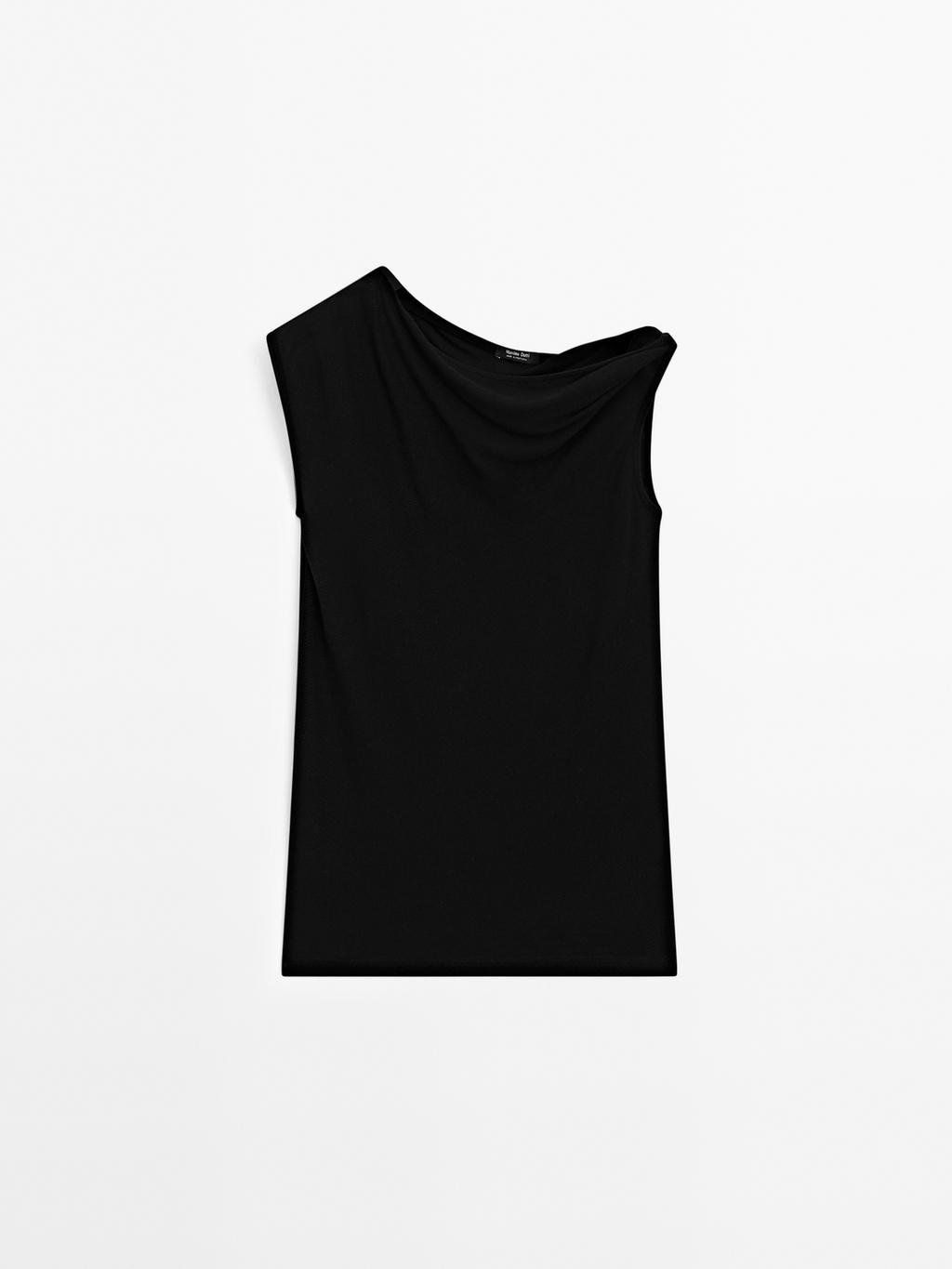 Asymmetric top with knot detail